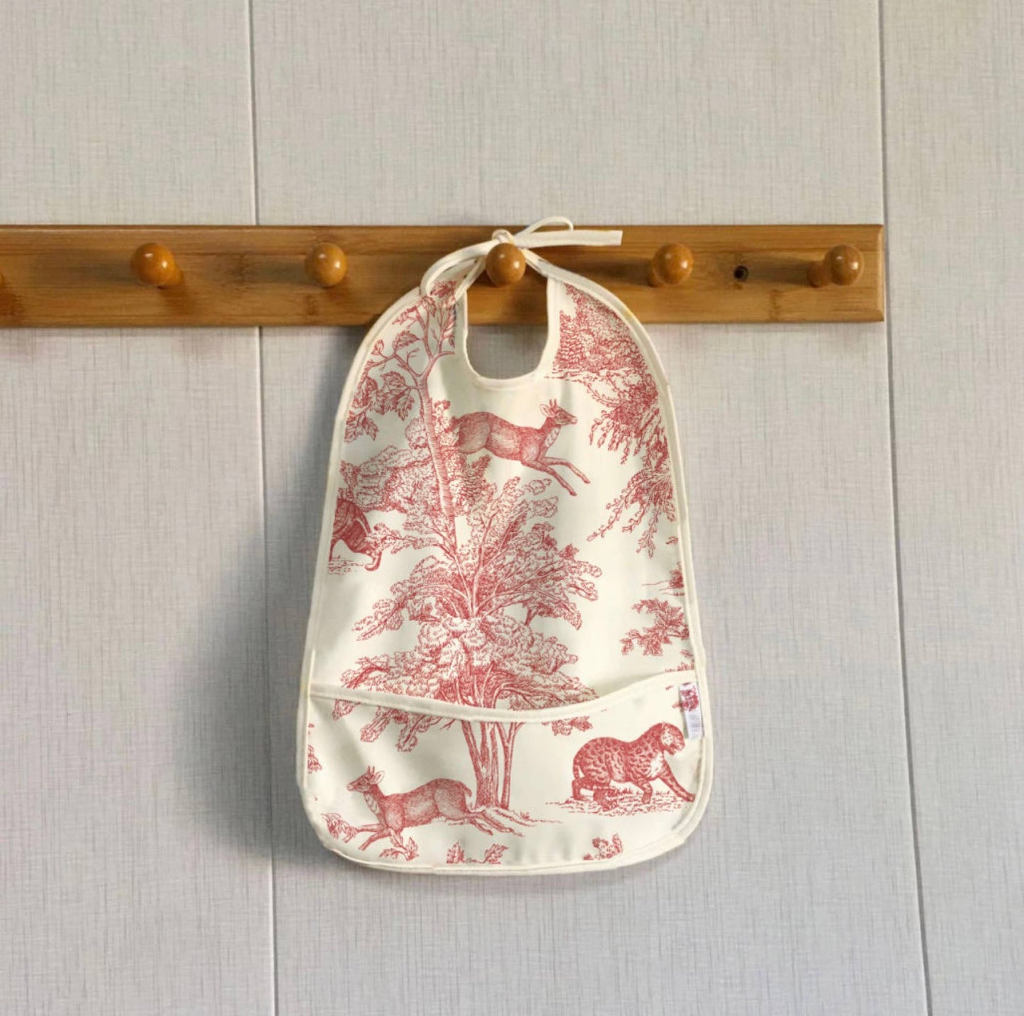Baby/child bib with pocket