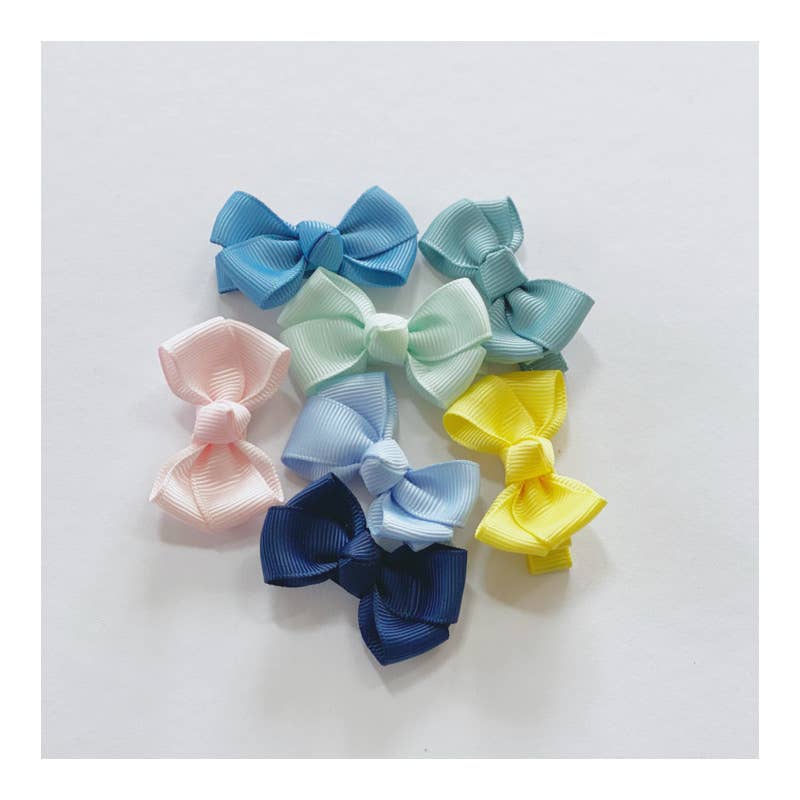 Estelle hair bow with clip in navy blue