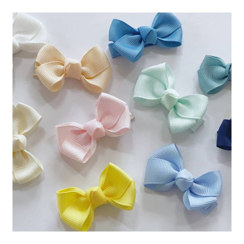 Estelle hair bow with clip in powder pink