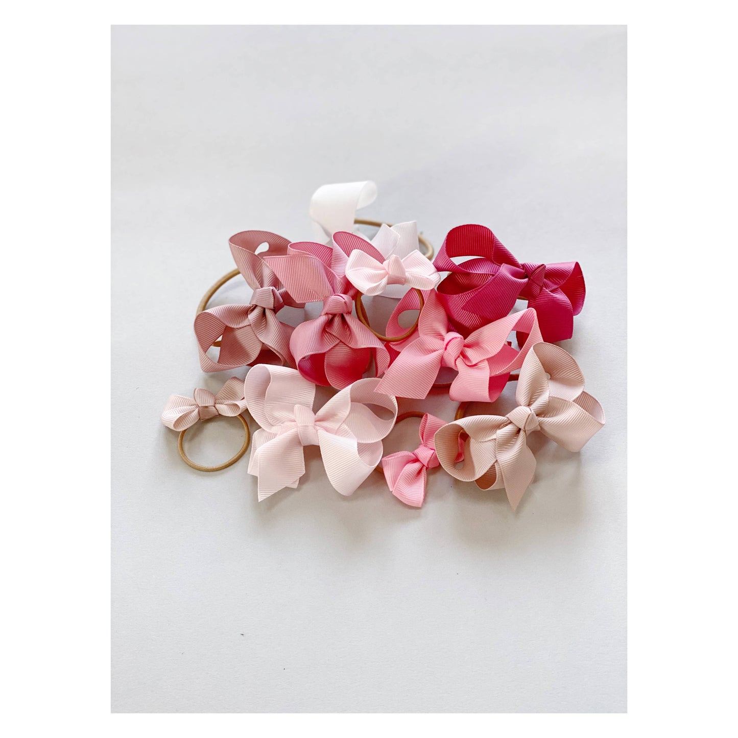 Maxima hair bow with clip in powder pink